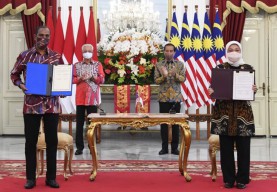 Indonesia-Malaysia Sepakati MoU Perlindungan Pekerja Migran Indonesia