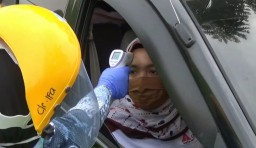 Masuk Wilayah Gresik Periksa Suhu Tubuh