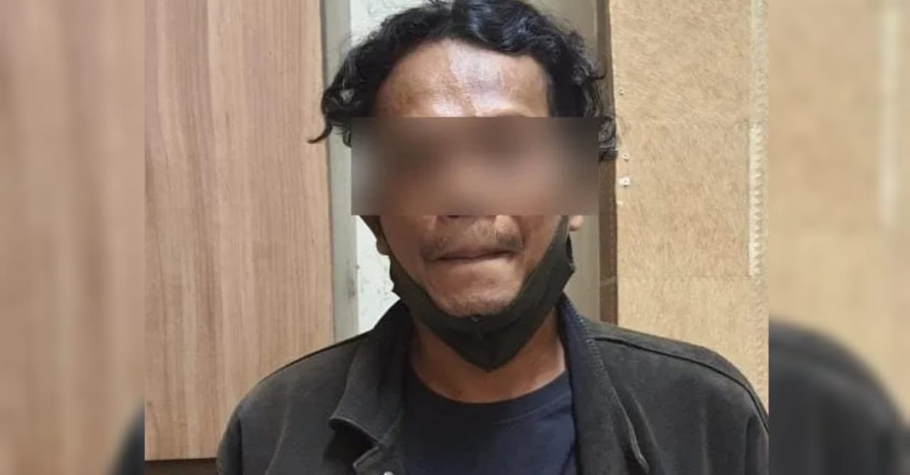 Tersangka HM saat ditangkap di UPPA Satreskrim Polrestabes Surabaya. | HMP/ (ist)