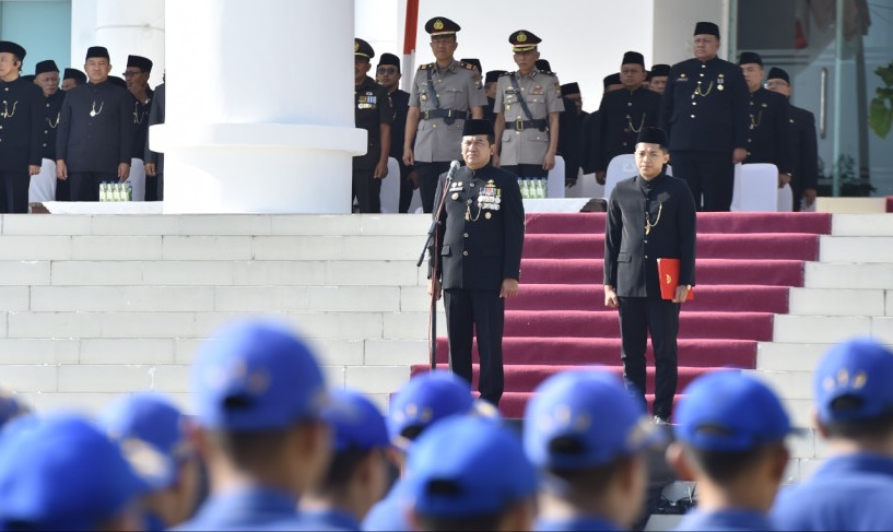 Upacara Peringatan Hari Jadi Ke-79 Provinsi Jawa Timur yang digelar oleh Pemerintah Kabupaten Pasuruan. Bertempat di Halaman Gedung Graha Maslahat, Kompleks Perkantoran Pemkab Pasuruan, upacara ini dipimpin langsung oleh Penjabat (Pj) Bupati Pasuruan, Nur