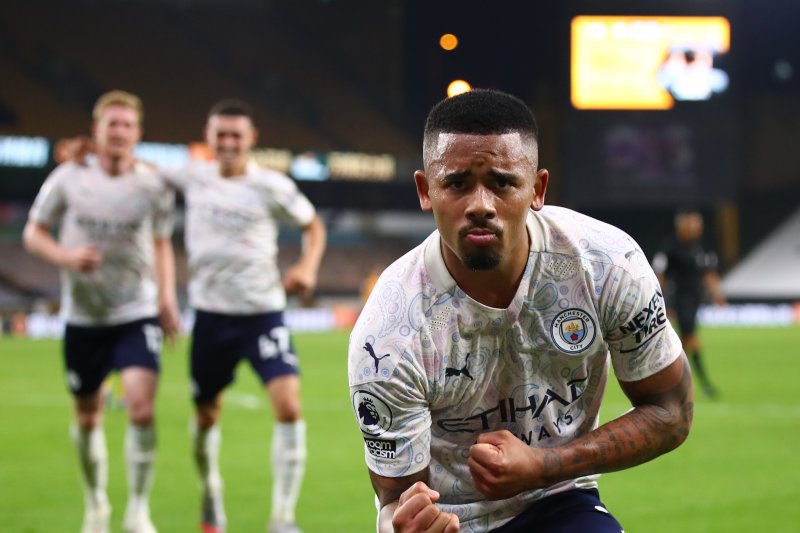 Pemain Manchester City Gabriel Jesus merayakan golnya ke gawang Wolverhampton Wanderers dalam pertandingan Liga Inggris kedua tima di Stadion Molineux, Wolverhampton, Inggris, pada 21 2020. (Pool via REUTERS/MARC ATKINS)
